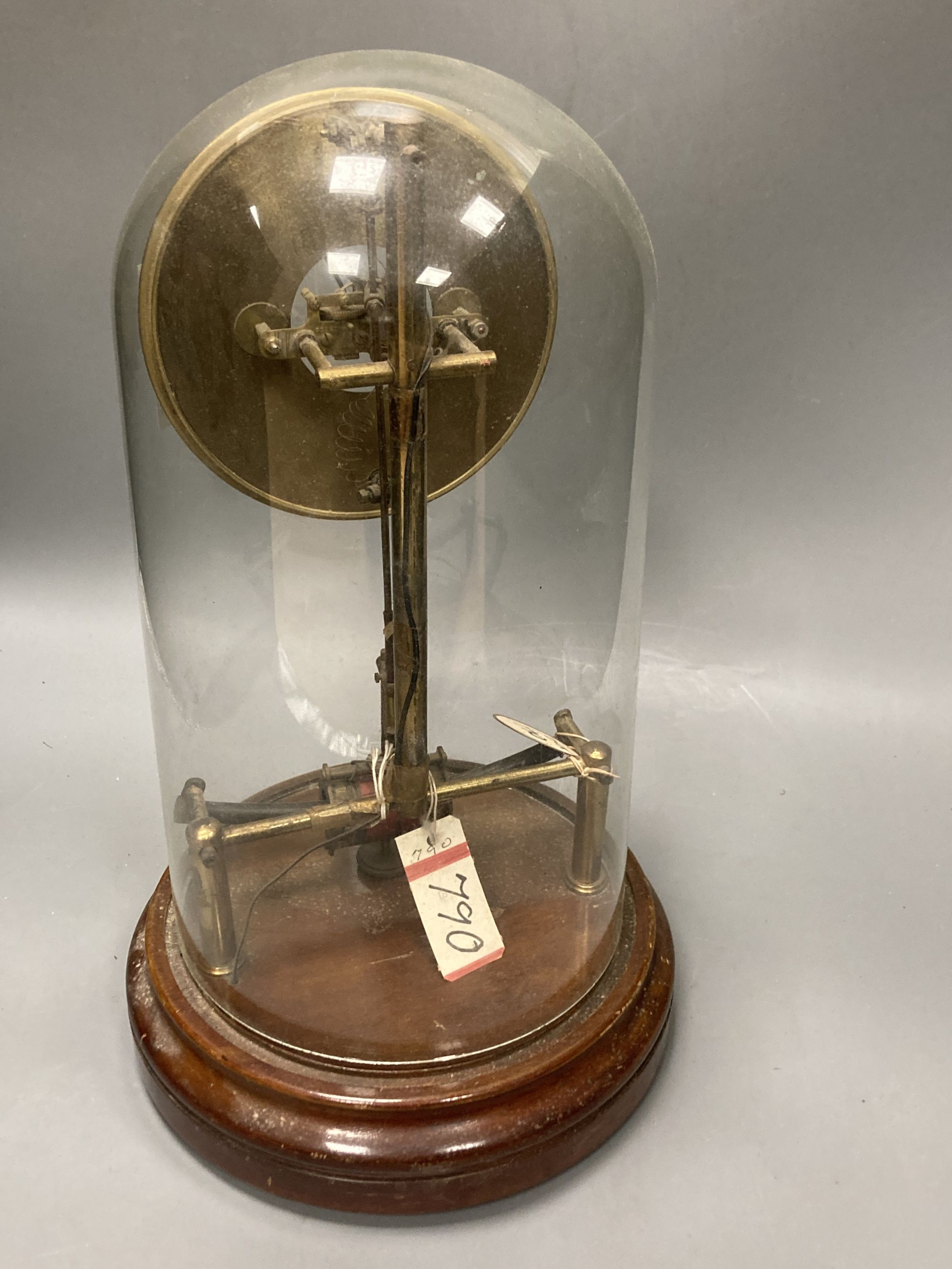 A Bulle skeleton electric mantel clock, under a glass dome, height 38cm